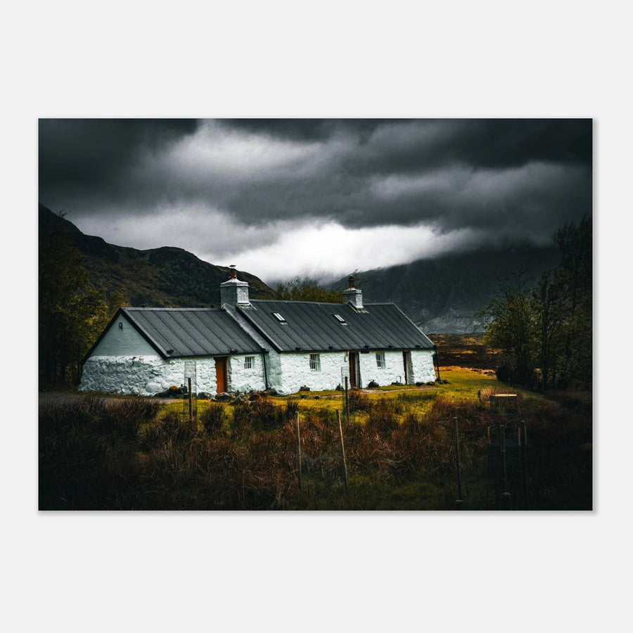 Blackrock Cottage Glencoe wall art featuring a moody landscape with dramatic clouds and rugged mountains.