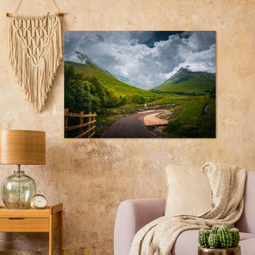 Glencoe orbital route stormy sky wall art with path leading through trees towards Pap of Glencoe under dark clouds