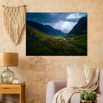 Glencoe valley wall art with moody clouds over steep Highland mountains and glen road