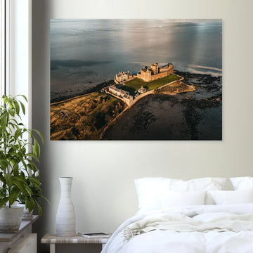Blackness Castle aerial sunset wall art with fortress and pier glowing in golden evening light