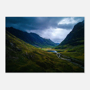 Glencoe valley wall art with moody clouds over steep Highland mountains and glen road