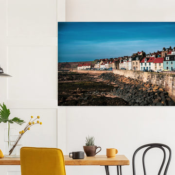 Pittenweem village wall art with white cottages and red roofs along narrow East Neuk street