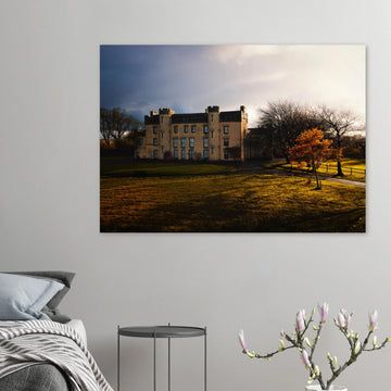 House of the Binns sunset wall art with golden sky over historic house and parkland