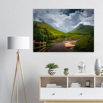 Glencoe orbital route stormy sky wall art with path leading through trees towards Pap of Glencoe under dark clouds