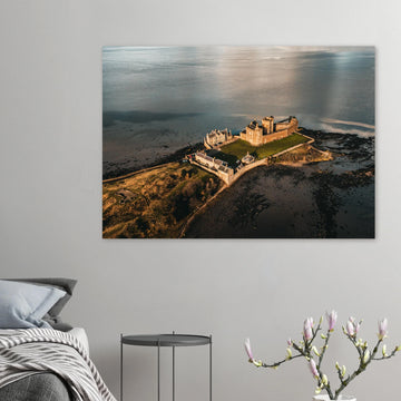 Blackness Castle aerial sunset wall art with fortress and pier glowing in golden evening light