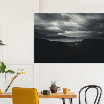 Loch Linnhe Scottish Highlands wall art showing a dark moody view over the sea loch with distant hills and heavy storm clouds above the Scottish coastline