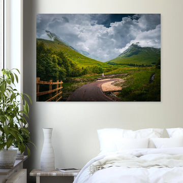 Glencoe orbital route stormy sky wall art with path leading through trees towards Pap of Glencoe under dark clouds
