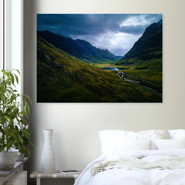 Glencoe valley wall art with moody clouds over steep Highland mountains and glen road