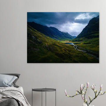 Glencoe valley wall art with moody clouds over steep Highland mountains and glen road