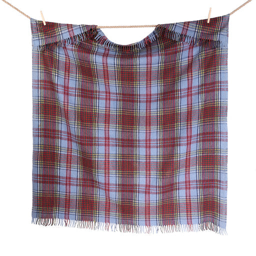 Highland Wool Blend Tartan Blanket / Warm Anderson Plaid blanket hanging on a clothesline against a white background 