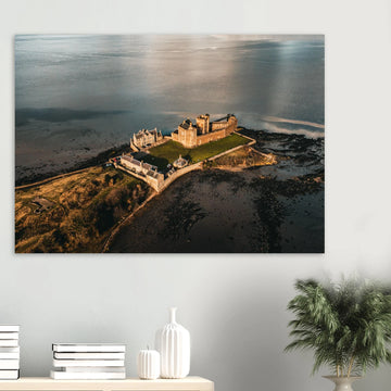 Blackness Castle aerial sunset wall art with fortress and pier glowing in golden evening light