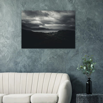 Loch Linnhe Scottish Highlands wall art showing a dark moody view over the sea loch with distant hills and heavy storm clouds above the Scottish coastline