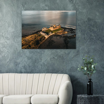 Blackness Castle aerial sunset wall art with fortress and pier glowing in golden evening light