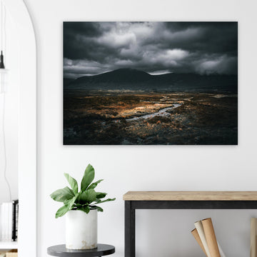 West Highland Way wall art featuring a moody Scottish Highlands landscape with dramatic storm clouds and winding river.
