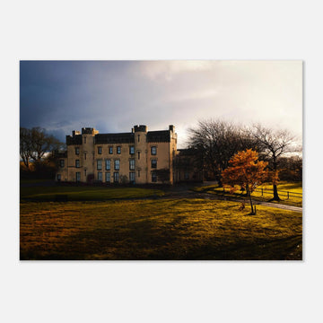 House of the Binns sunset wall art with golden sky over historic house and parkland