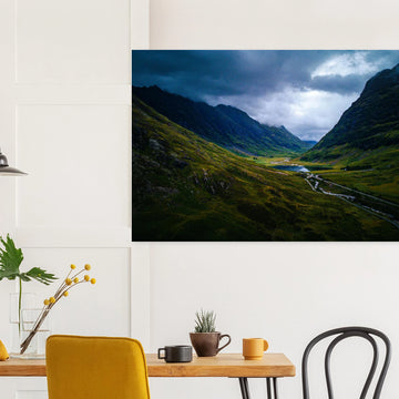 Glencoe valley wall art with moody clouds over steep Highland mountains and glen road