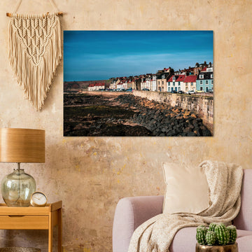 Pittenweem village wall art with white cottages and red roofs along narrow East Neuk street