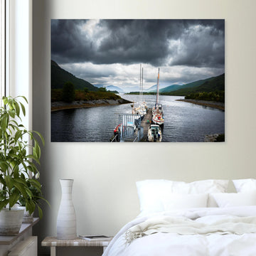 Ballachulish Harbour wall art showing yachts lined up along a narrow pier between green hills with dark storm clouds over the Scottish waterway